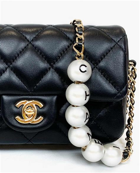 black pearl chanel bag|chanel bag with pearl chain.